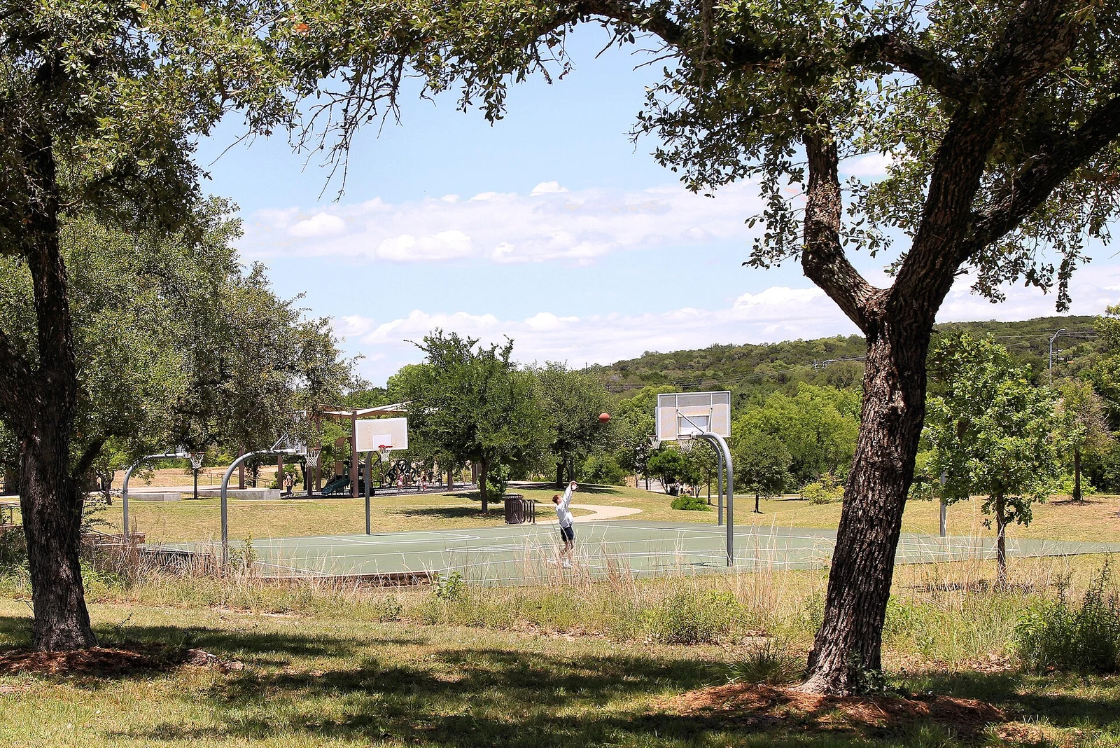 Bee Cave Central Park, photographed in 2022 · city context, not a photograph of Spanish Oaks or Falconhead