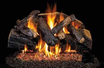 Charred Majestic Oak log set pictured with flames in the supplier catalog