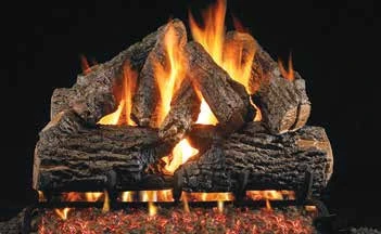 Charred Oak log set pictured with flames in the supplier catalog