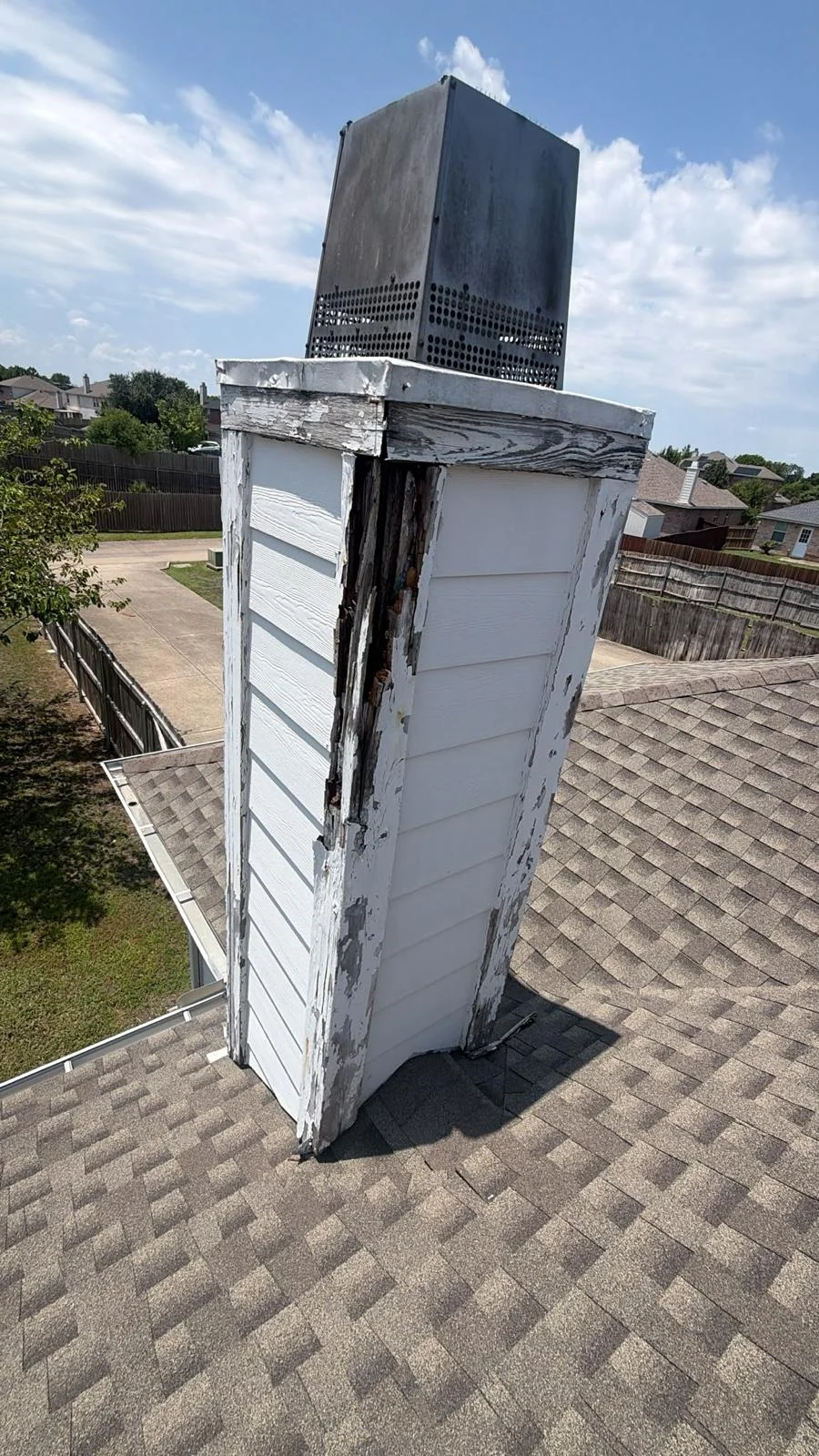 Before: chimney siding repair