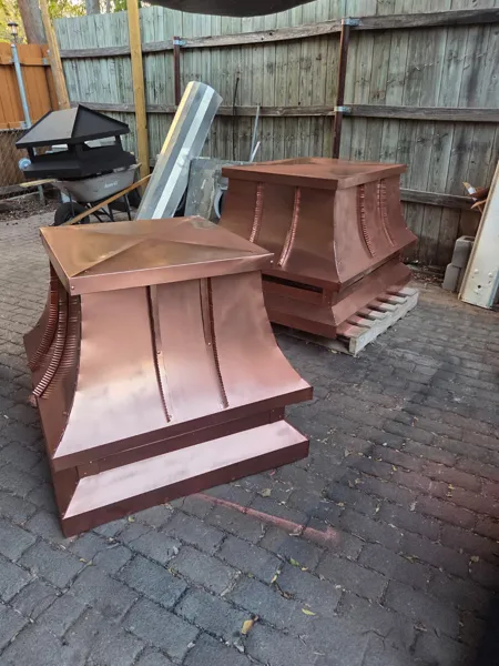 Master Pro supplied work photograph of fabricated custom chimney caps in the workshop