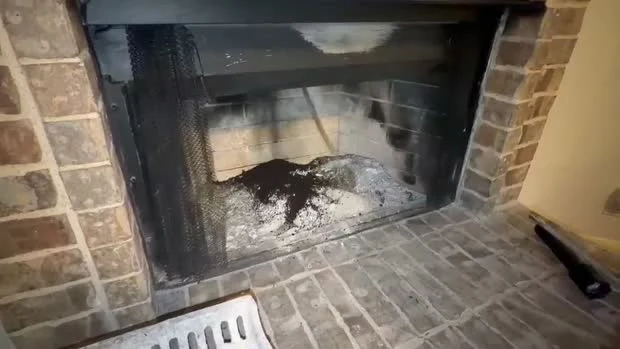 Chimney cleaning in progress
