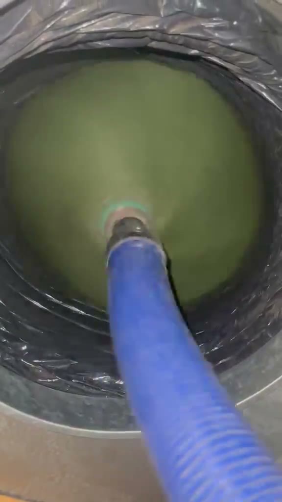 Brush and blue hose inside a duct in Master Pro work footage